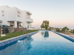 Posh Holiday Home in Gennadi with Shared Swimming Pool